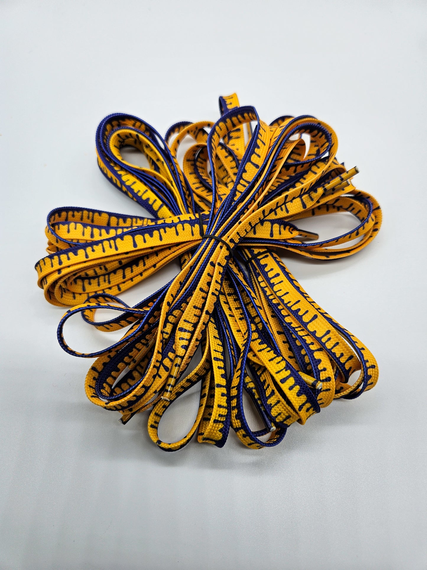 Purple & yellow drip shoelaces